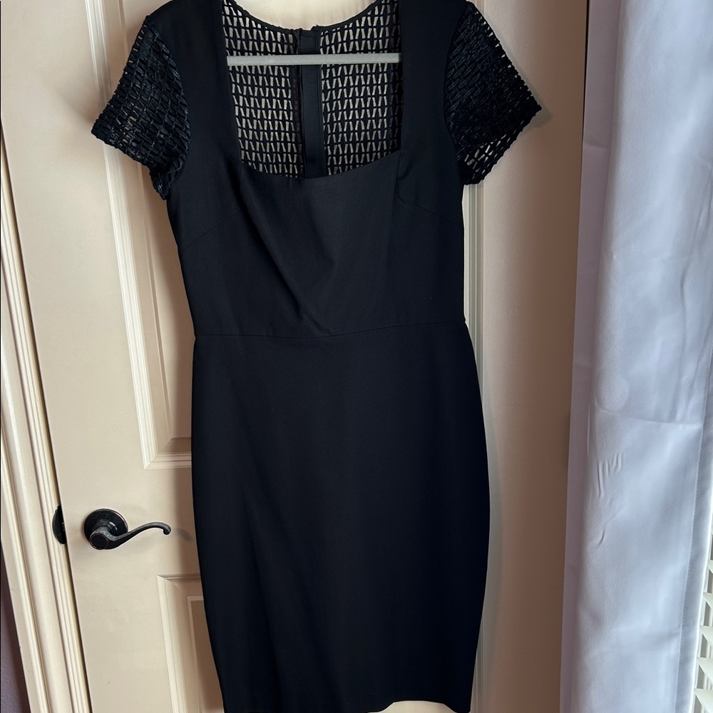 Banana Republic Black Midi Dress with Textured Sleeves
#031